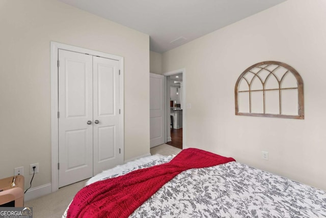6460 Valley Crossing Way, Cumming, GA 30028 - carpeted bedroom with a closet and baseboards