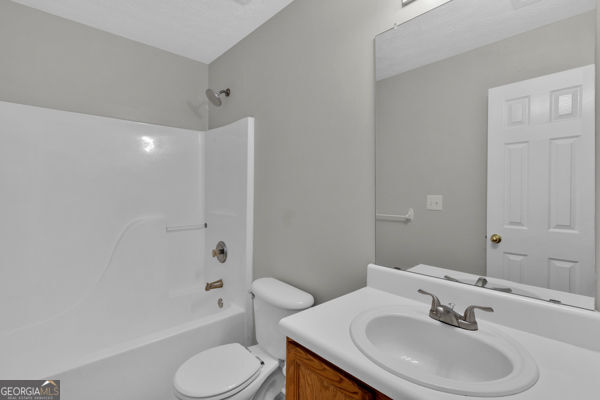 7770 Hana Ct, Jonesboro, GA 30236 - full bath with vanity and washtub / shower combination