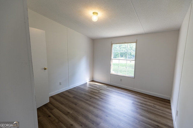 179 Autumnwood Way, Cleveland, GA 30528 - spare room featuring wood finished floors and a textured ceiling
