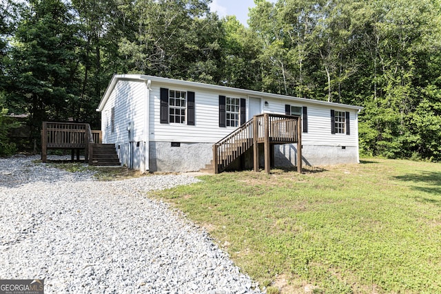 179 Autumnwood Way, Cleveland, GA 30528 - manufactured / mobile home with stairs, crawl space, and a wooden deck