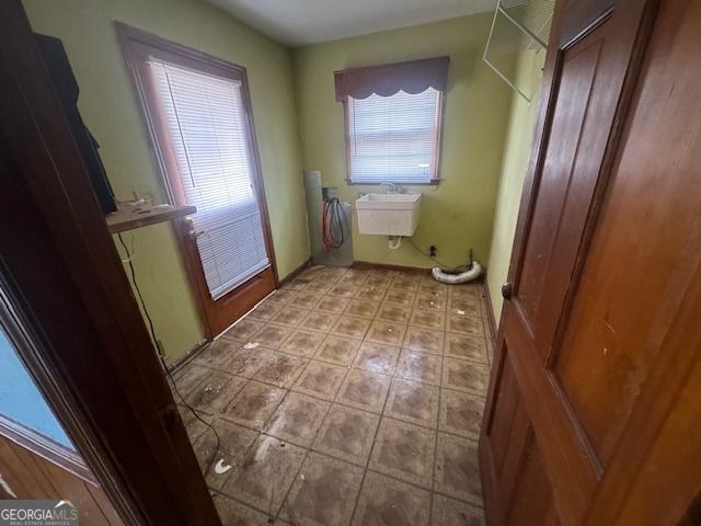 3415 Spring Valley Blvd, South Fulton, GA 30349 - laundry room featuring a sink