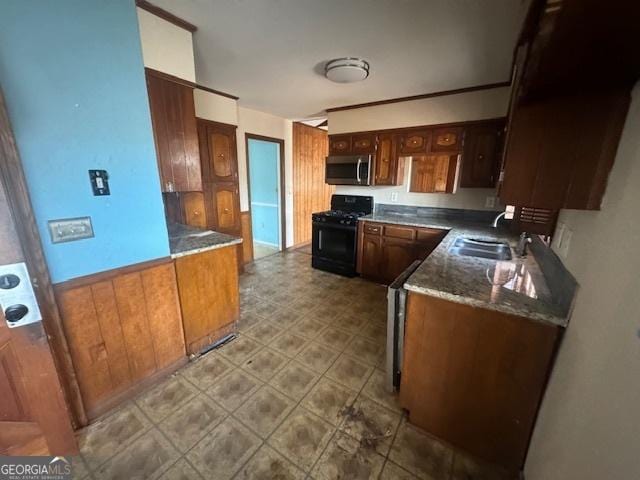 3415 Spring Valley Blvd, South Fulton, GA 30349 - kitchen featuring black gas range oven and stainless steel microwave