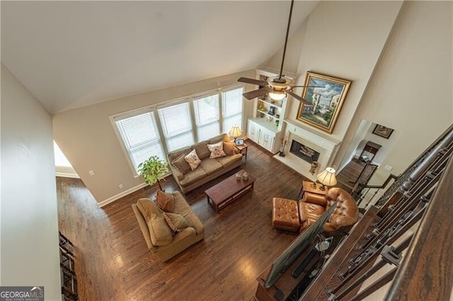 660 Glendalough Ct, Alpharetta, GA 30004 - living room with ceiling fan, a fireplace with flush hearth, wood finished floors, and high vaulted ceiling