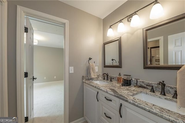 660 Glendalough Ct, Alpharetta, GA 30004 - full bath featuring double vanity and baseboards