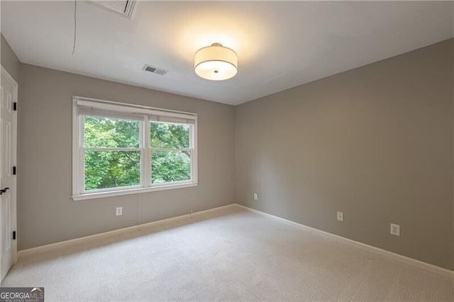 660 Glendalough Ct, Alpharetta, GA 30004 - spare room featuring light carpet and attic access