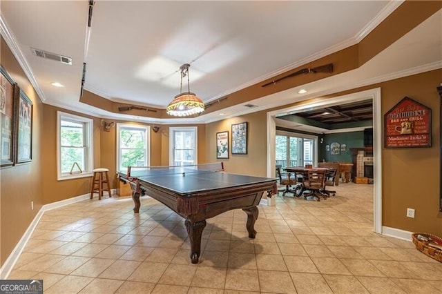 660 Glendalough Ct, Alpharetta, GA 30004 - playroom with a raised ceiling, crown molding, pool table, light tile patterned flooring, and a fireplace