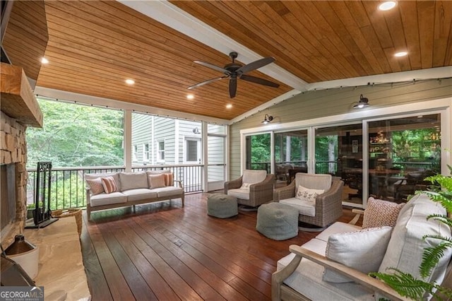 660 Glendalough Ct, Alpharetta, GA 30004 - sunroom / solarium featuring an outdoor living space with a fireplace and a ceiling fan