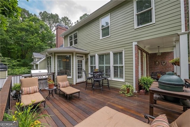660 Glendalough Ct, Alpharetta, GA 30004 - wooden terrace featuring outdoor dining space
