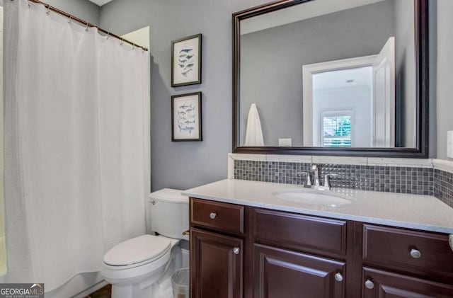 3467 Brookleigh Ln NE, Atlanta, GA 30319 - bathroom with decorative backsplash, vanity, and curtained shower