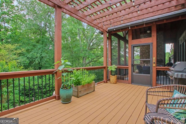 3467 Brookleigh Ln NE, Atlanta, GA 30319 - wooden deck featuring a pergola and a sunroom
