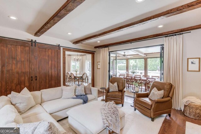 120 Slate Dr, Buford, GA 30518 - living area with beam ceiling, a barn door, recessed lighting, and light wood-style floors