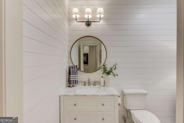 120 Slate Dr, Buford, GA 30518 - half bath with vanity and wooden walls