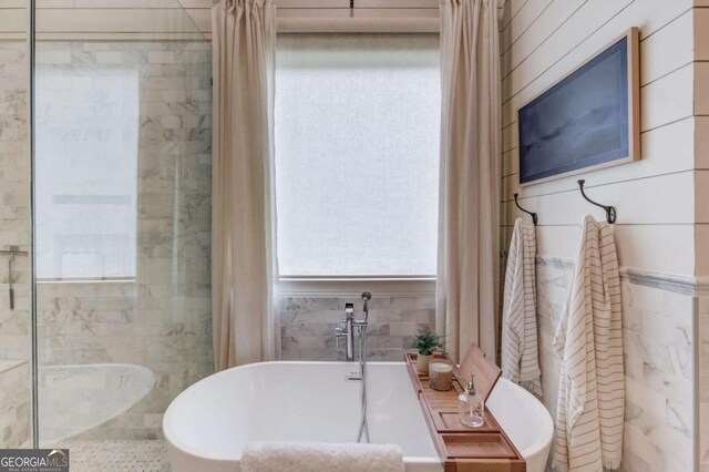 120 Slate Dr, Buford, GA 30518 - bathroom with a freestanding tub and a stall shower
