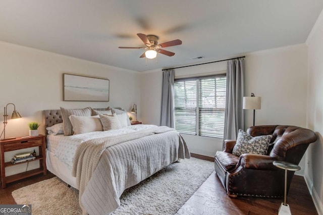 120 Slate Dr, Buford, GA 30518 - bedroom with wood finished floors, ornamental molding, and a ceiling fan
