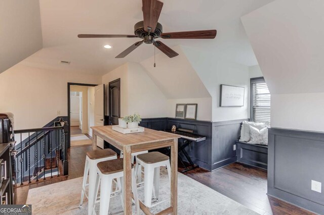 120 Slate Dr, Buford, GA 30518 - dining space with lofted ceiling, dark wood-style flooring, a ceiling fan, a wainscoted wall, and recessed lighting