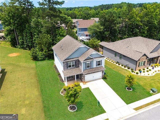 3390 Meadow Grass Dr, Dacula, GA 30019 - aerial view of property and surrounding area with a heavily wooded area