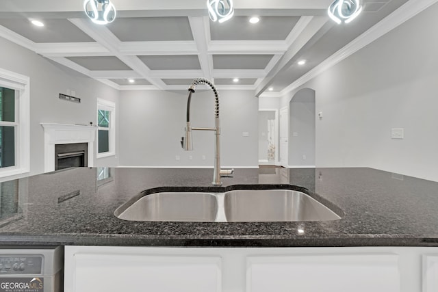 7043 Lancaster Xing, Flowery Branch, GA 30542 - kitchen with open floor plan, coffered ceiling, dark stone countertops, white cabinets, and a fireplace