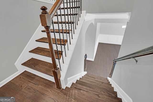 7043 Lancaster Xing, Flowery Branch, GA 30542 - stairs featuring wood finished floors and baseboards