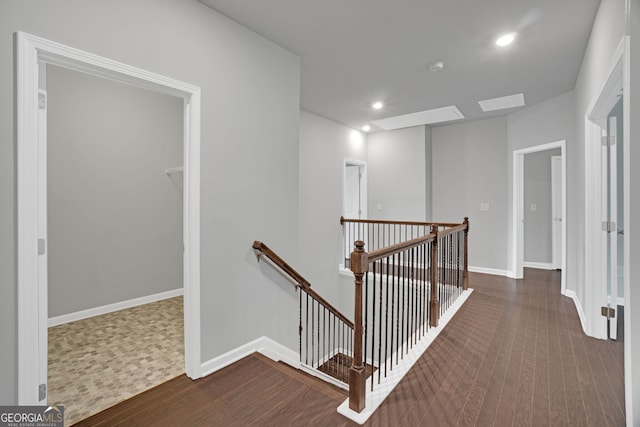 7043 Lancaster Xing, Flowery Branch, GA 30542 - corridor featuring an upstairs landing, wood finished floors, and recessed lighting