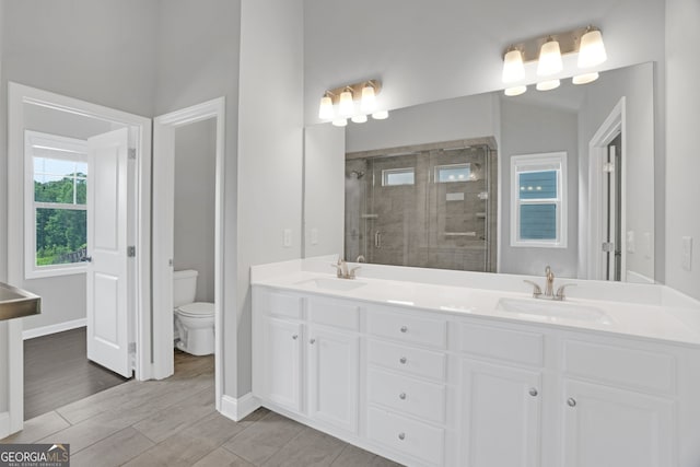 7043 Lancaster Xing, Flowery Branch, GA 30542 - bathroom with double vanity and a shower stall