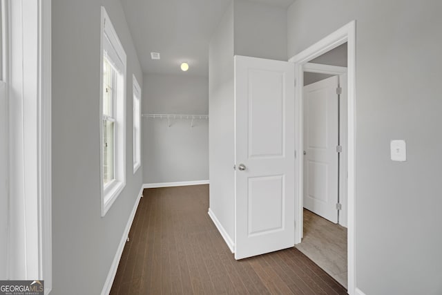 7043 Lancaster Xing, Flowery Branch, GA 30542 - hall featuring dark wood-style flooring and baseboards