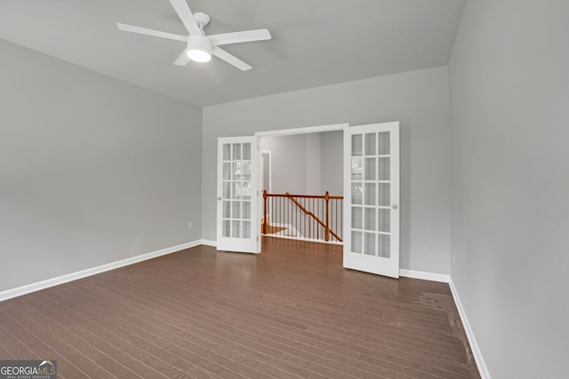 7043 Lancaster Xing, Flowery Branch, GA 30542 - empty room featuring french doors, dark wood-type flooring, and ceiling fan