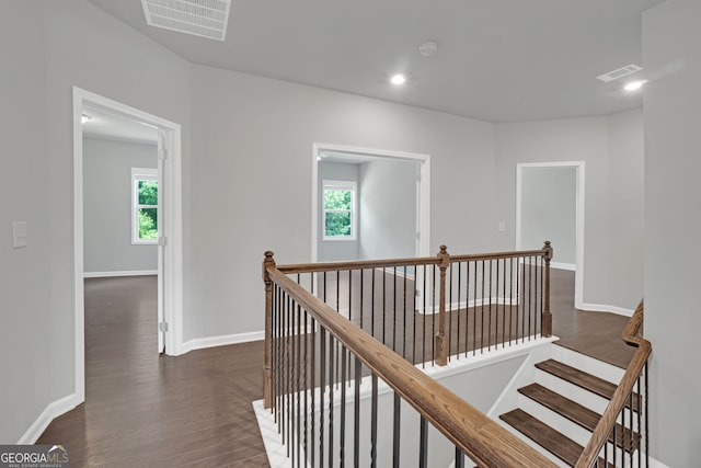 7043 Lancaster Xing, Flowery Branch, GA 30542 - corridor with an upstairs landing, wood finished floors, and recessed lighting