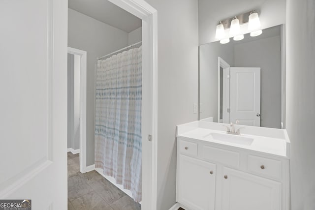 7043 Lancaster Xing, Flowery Branch, GA 30542 - bathroom with vanity and curtained shower