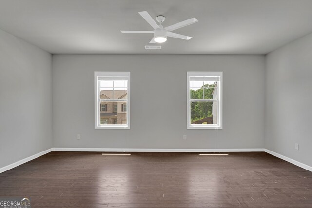 7043 Lancaster Xing, Flowery Branch, GA 30542 - unfurnished room featuring wood-type flooring and a ceiling fan