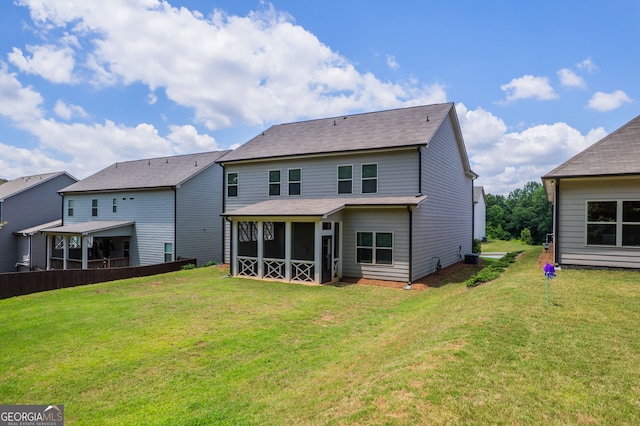 7043 Lancaster Xing, Flowery Branch, GA 30542 - back of property with a sunroom and a yard