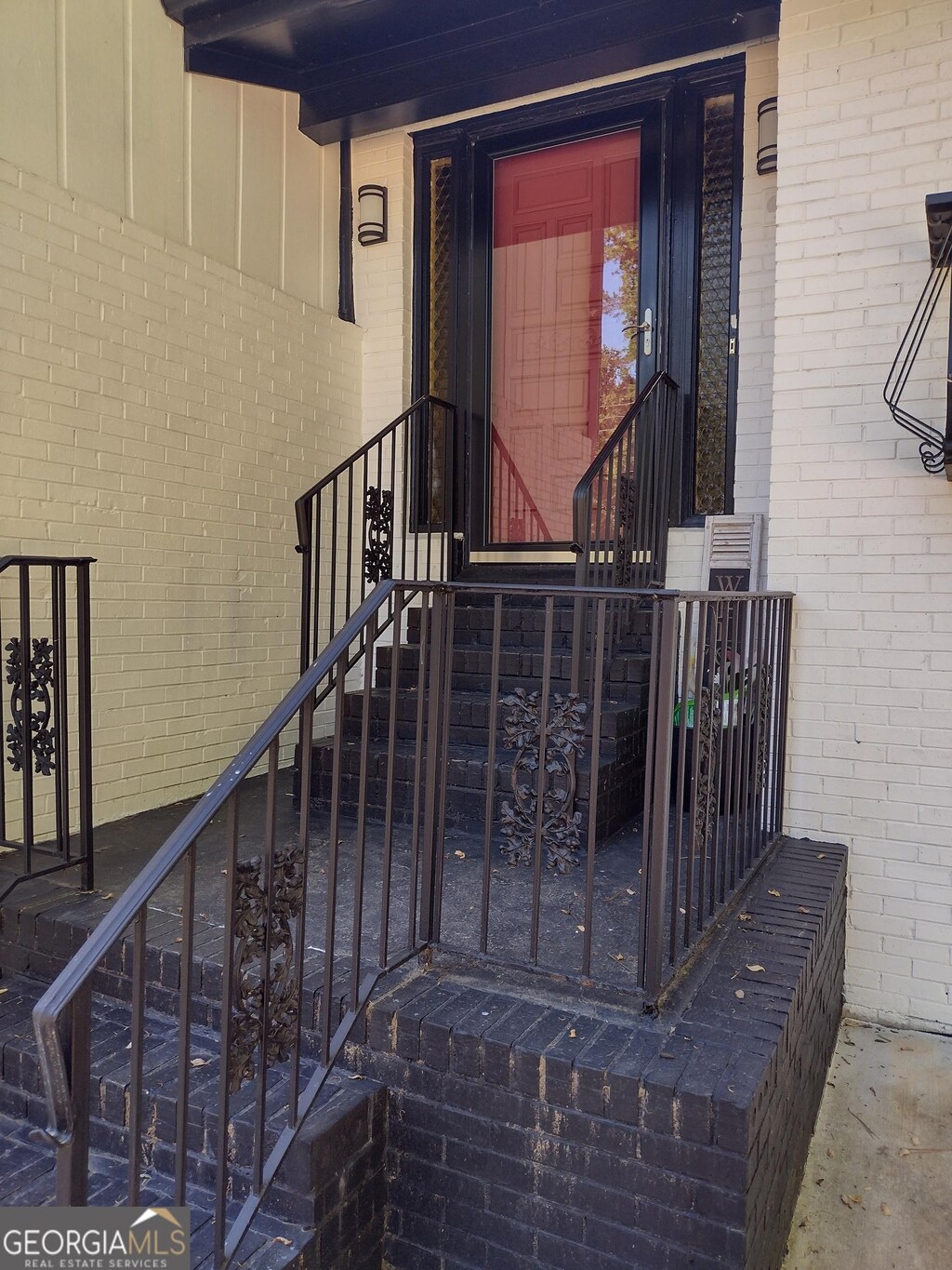 5840 Butner Rd, South Fulton, GA 30349 - property entrance with brick siding