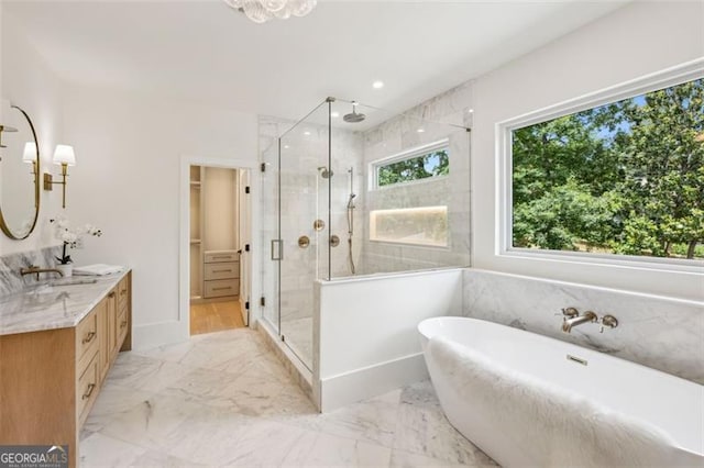 1312 Becket Dr NE, Brookhaven, GA 30319 - full bathroom featuring a stall shower, double vanity, a soaking tub, and marble finish flooring