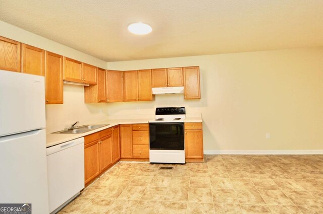 1824 Cedar Shoals Dr, Athens, GA 30605 - kitchen featuring white appliances, under cabinet range hood, and light countertops