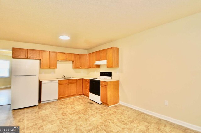 1824 Cedar Shoals Dr, Athens, GA 30605 - kitchen featuring white appliances, light countertops, under cabinet range hood, and recessed lighting