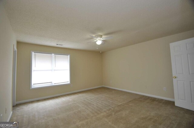 1824 Cedar Shoals Dr, Athens, GA 30605 - empty room featuring carpet flooring and ceiling fan