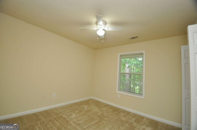 1824 Cedar Shoals Dr, Athens, GA 30605 - unfurnished room featuring a ceiling fan, light colored carpet, and a textured ceiling
