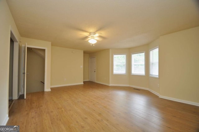 1824 Cedar Shoals Dr, Athens, GA 30605 - spare room with light wood finished floors and ceiling fan