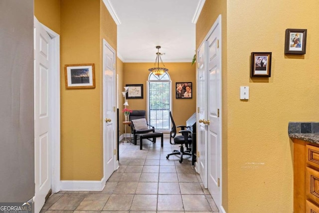 3071 Lenox Rd NE Unit 19, Atlanta, GA 30324 - corridor with ornamental molding, a textured wall, and light tile patterned flooring