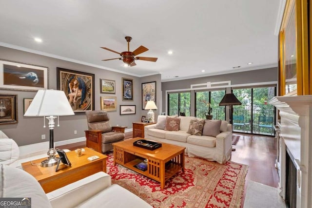 3071 Lenox Rd NE Unit 19, Atlanta, GA 30324 - living area with a fireplace, wood finished floors, ceiling fan, crown molding, and recessed lighting