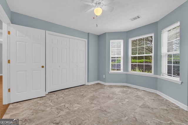 110 Northridge Dr, Demorest, GA 30535 - unfurnished bedroom with a closet and a ceiling fan