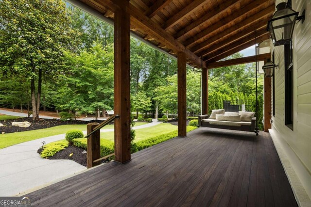 13365 Hopewell Rd, Alpharetta, GA 30004 - wooden deck featuring a lawn and view of scattered trees