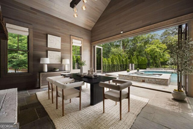 13365 Hopewell Rd, Alpharetta, GA 30004 - sunroom with a hot tub and lofted ceiling