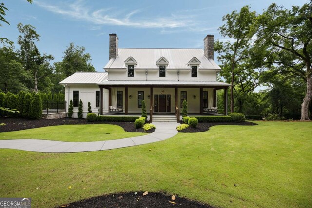 13365 Hopewell Rd, Alpharetta, GA 30004 - view of front of home with a chimney, covered porch, and a front lawn