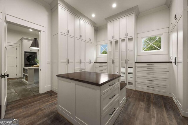 13365 Hopewell Rd, Alpharetta, GA 30004 - spacious closet featuring washer / dryer and dark wood-style floors