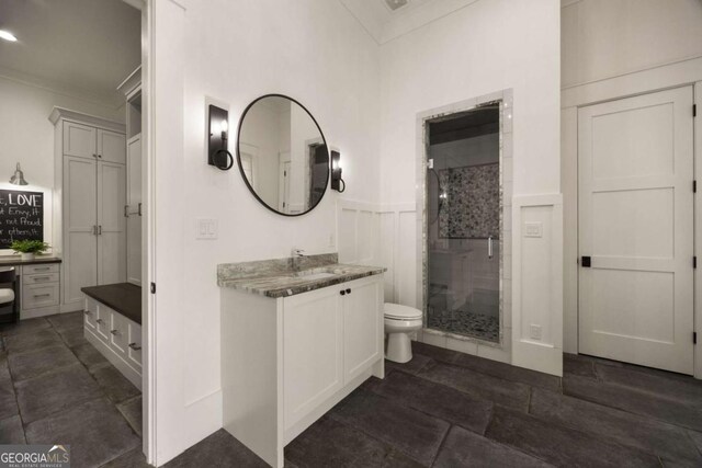 13365 Hopewell Rd, Alpharetta, GA 30004 - full bathroom with vanity, a shower stall, wainscoting, and ornamental molding