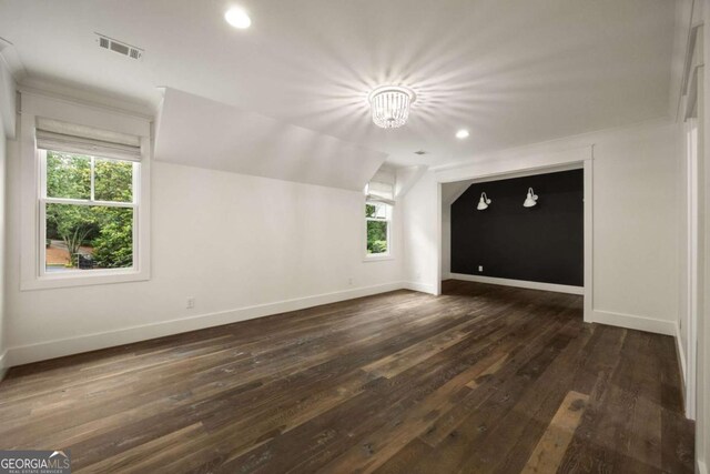 13365 Hopewell Rd, Alpharetta, GA 30004 - additional living space featuring plenty of natural light, dark wood-style floors, vaulted ceiling, recessed lighting, and a chandelier
