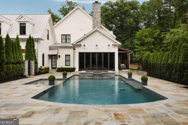 13365 Hopewell Rd, Alpharetta, GA 30004 - view of swimming pool with a patio area and a pool with connected hot tub