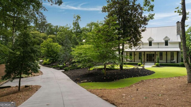 13365 Hopewell Rd, Alpharetta, GA 30004 - surrounding community featuring a lawn