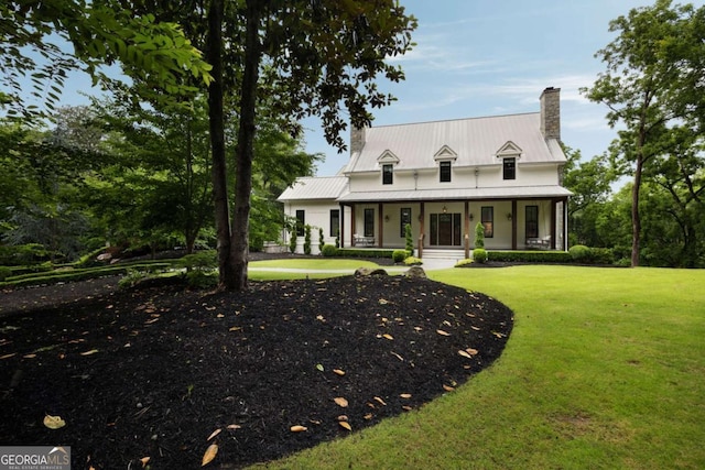 13365 Hopewell Rd, Alpharetta, GA 30004 - modern farmhouse featuring a chimney, a porch, and a front lawn