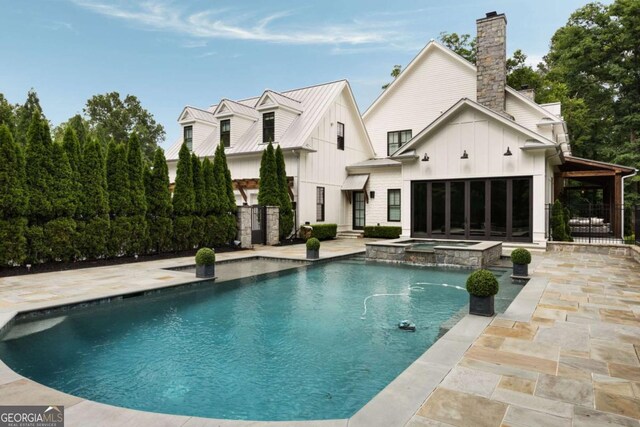 13365 Hopewell Rd, Alpharetta, GA 30004 - view of pool with a patio area and a pool with connected hot tub